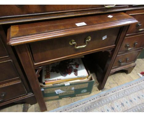 Reproduction mahogany crossbanded single drawer lamp table on square reeded supports 