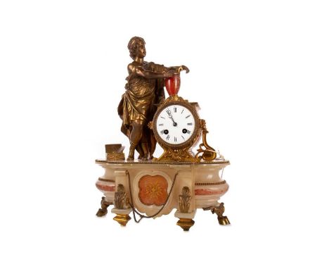 GILT METAL AND ONYX FIGURAL MANTEL CLOCK, LATE 19TH CENTURY with twin train movement striking on a bell, the white enamel dia