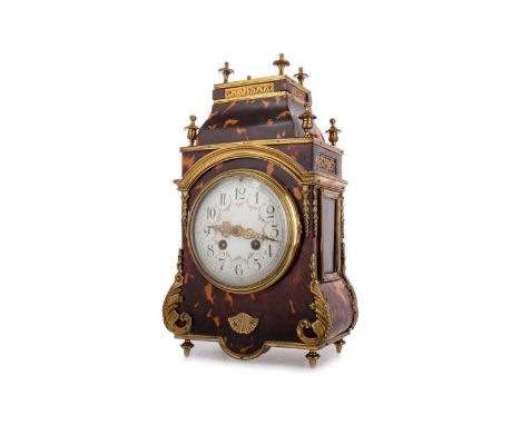 TORTOISESHELL AND GILT METAL MANTEL CLOCK, LATE 19TH CENTURY with two train eight day movement stamped D.C.Co. (possibly Doug