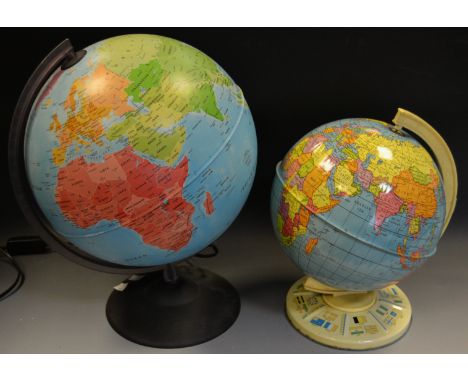 A Chad Valley tin plate terrestrial globe; another larger as a light. (2)