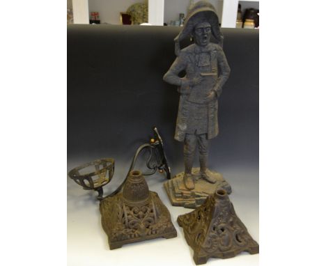 Metalware - an Art Nouveau iron wall sconce; a near pair of early 20th century cast iron oil lantern bases; an early 19th cen