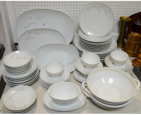 A Noritake China Windrift pattern part dinner service comprising, plates, side plates, bowls, meat sauce boat, teacups & sauc
