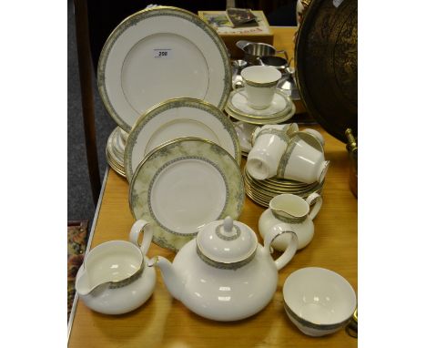 A Royal Doulton Isabella pattern dinner service, comprising seven dinner plates, four dessert plates, eight side plates, sauc