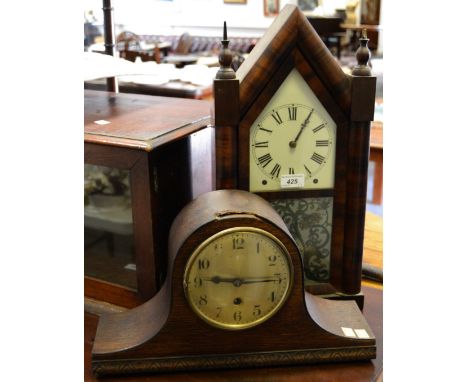 Clocks - a late 19th century American Ansonia type clock, painted panel; an early 20th century oak Napoleon mantel clock. (2)