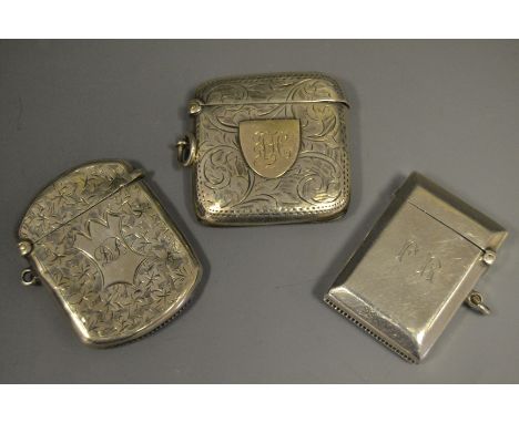 An Edwardian silver Vesta case, plain bevelled edged, engraved FR, by Rolason Brothers, Birmingham, 1918;a Edwardian silver V