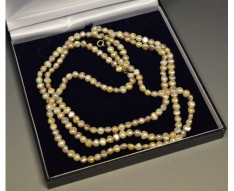 A three strand cultured pearl necklace, pink, white & cream random pearls 45cms