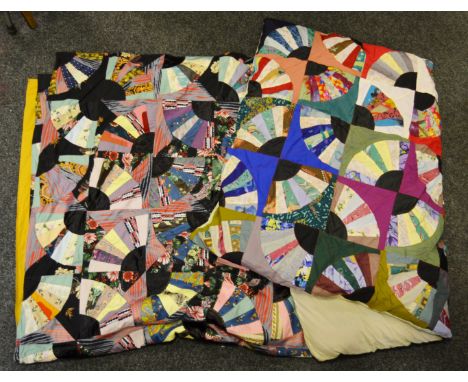 Textiles - an Art Deco inspired patchwork bed cover, arranged in a segmented sunburst style, geometric design, with assorted 