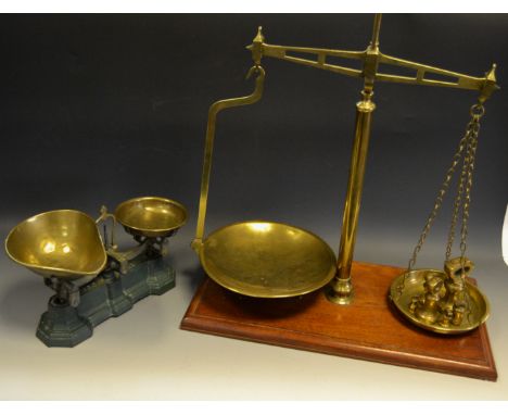 An early 20th century shopkeepers scales; early 20th century kitchen scales (2)