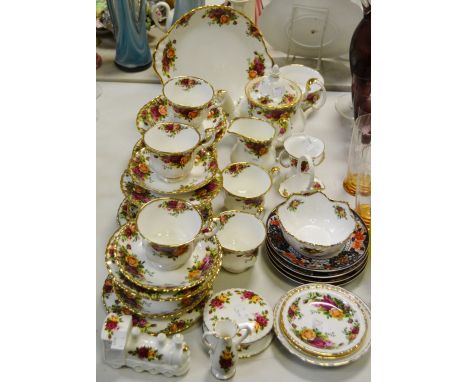 Royal Albert  - an Old Country Rose Pattern six setting tea set inc Teapot, sugar, milk, cake plate, cups and saucers, trinke