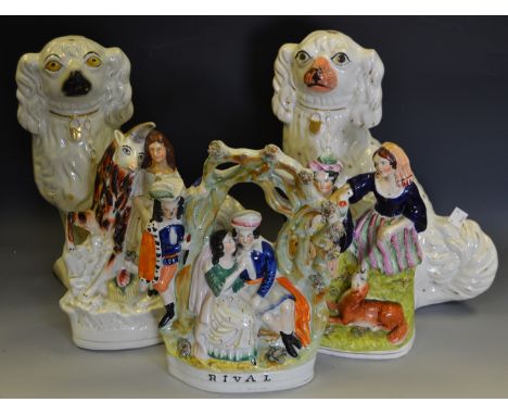 Staffordshire ceramics - a Victorian flatback centre piece Gentleman and his amour amongst foliage; mantel dogs etc. (5)