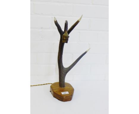 An Antler table lamp on oak base, 42cm high