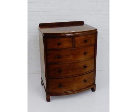 A mahogany chest, the rectangular bow front top over two short and three long drawers, on bracket supports, 106 x 78cm