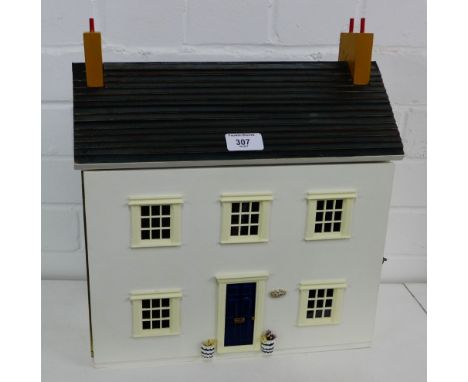 'The Lodge' a dolls house with pitched roof and four interior rooms, complete with a collection of miniature furniture and ac