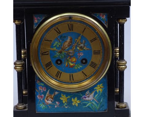 A French ebonised mantel clock with brass mounts, height 11" 