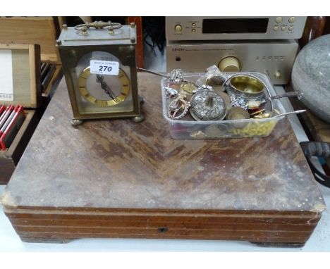 A carriage clock, canteen with various cutlery, costume jewellery 