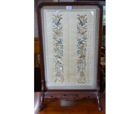 An Oriental hardwood-framed firescreen with an inset needlework and silk panel, W50cm, H80cm 