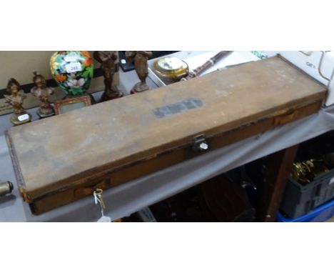 An Army and Navy Vintage gun case, with cleaning rod etc 