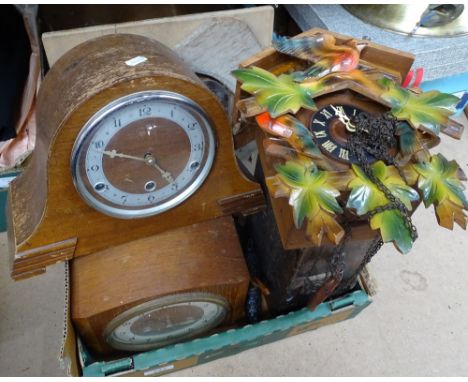 A cuckoo clock, mantel clocks etc 