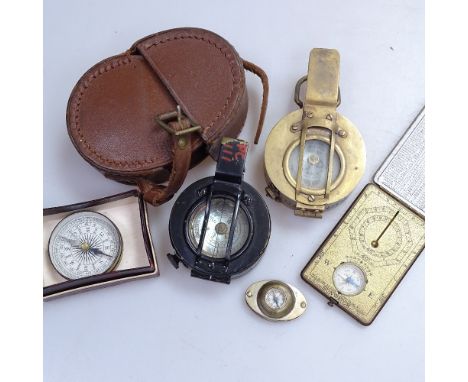 A leather-cased military compass, and 4 various brass compasses 