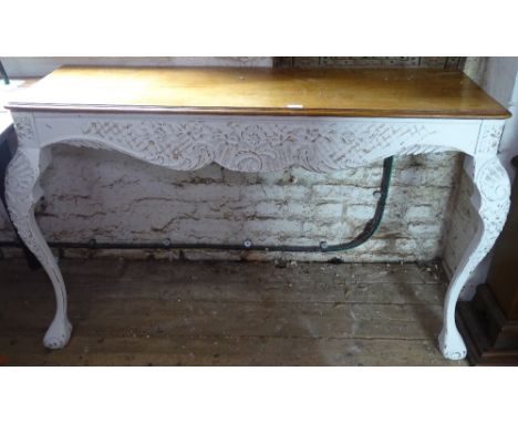 A walnut and white painted console table, raised on cabriole legs, L133cm, H82cm 