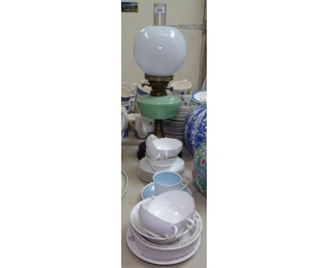 An oil lamp, Susie Cooper teaware and soups bowls, Beatrix Potter breakfastware 