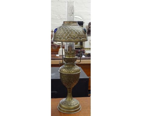 A brass oil lamp with stone set brass shade, height 15" 