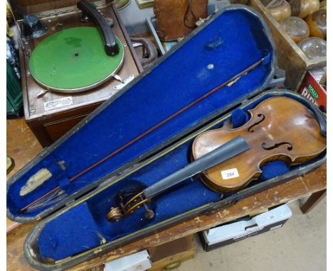 A violin and bow in case, and an air rifle 