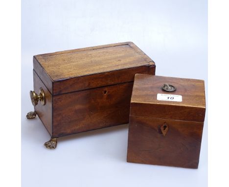 A Georgian caddy on brass paw feet, height 5", and an Antique mahogany caddy 