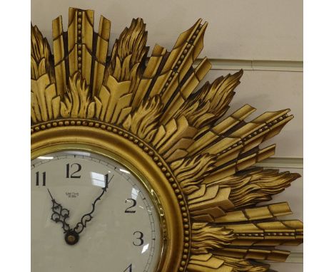 A Smiths sunburst wall clock 