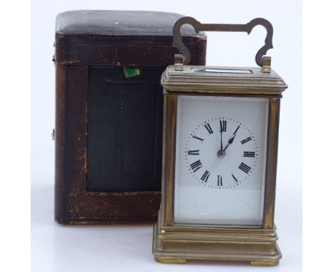 A French brass-cased carriage clock, early 20th century, 8-day movement, case height 12cm, in leather travelling case 