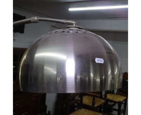 A large brushed steel floor arch lamp, on marble base 