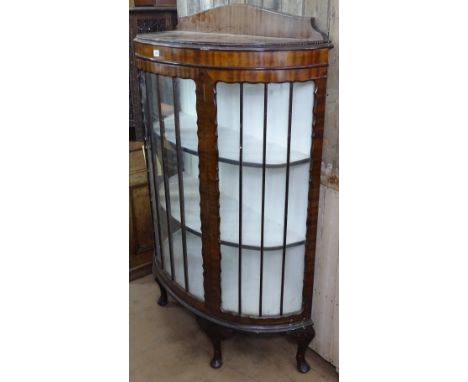 A 1930s walnut bow-front glass display cabinet, W100cm 