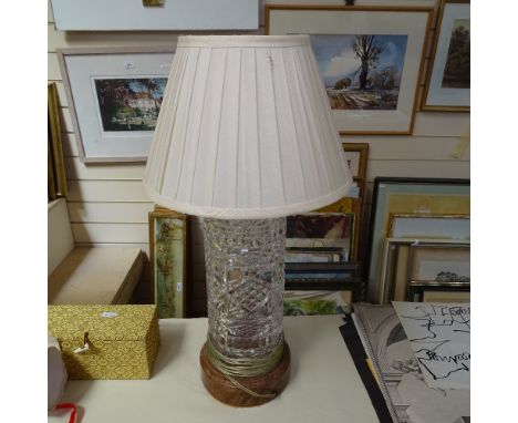A cut glass table lamp on wooden plinth with shade. Height 21"