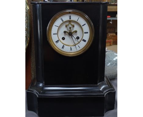 A black slate-cased mantel clock, with 2-train movement, height 15" 