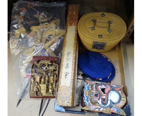 An Oriental fan, a kettle in basket, a cap, a puppet, and carved and gilded wall ornament 