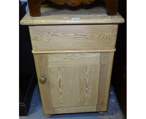 A polished pine side cabinet, with rising lid and panel door, W52cm 