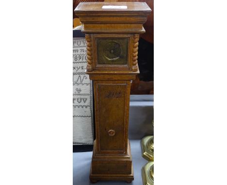 A longcase clock, 15.25" 