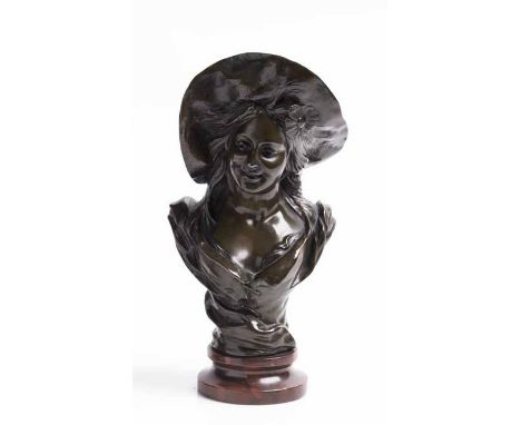 VICTOR BRUYNEEL (BELGIAN 19TH CENTURY)BUST OF A YOUNG GIRLpatinated bronze, signed 'V. Bruyneel', on a rouge marble circular 