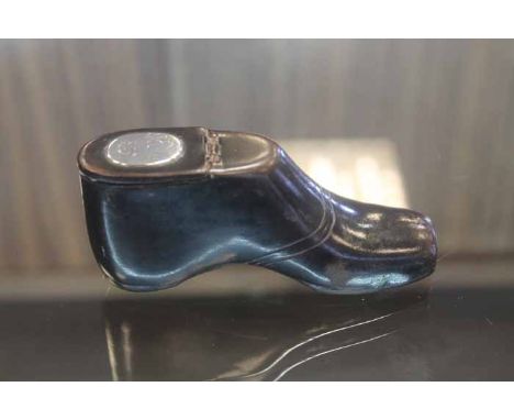 19TH CENTURY PAPIER MACHE SNUFF BOX IN THE FORM OF A BOOT
the hinged cover (hinge damaged) inset with an oval silver plaquett
