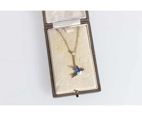 15ct gold pearl and enamel swallow pendant on yellow metal chain, 2.8g gross, in Mappin and Webb Ltd of London jewellery box.