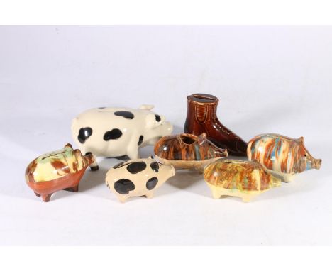 Five Scottish pottery pig money banks, longest 10cm long, also a ceramic pig money bank, and a model of a boot money bank.&nb