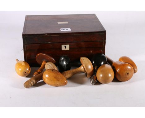 19th century rosewood box, 25cm x 19cm, containing ten wooden darning tools, 19th century and later, to include a 19th centur