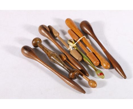 A group of nine wooden glove darning tools, 19th and 20th century. 
