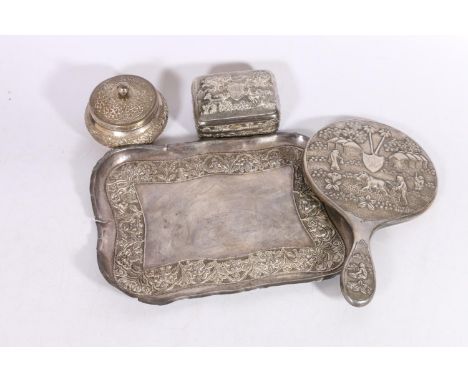 Indian white metal tray with repousse band depicting deities, 20cm x 26cm, 317g, an Indian silver hand mirror decorated with 