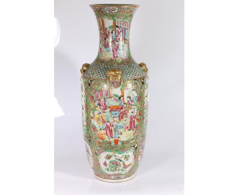 19th century Chinese Canton famille rose vase of baluster form, with long neck and flaring rim, the body decorated with alter