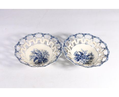 Two Coalbrookdale sweetmeat ceramic dishes, decorated with blue and white painted floral panels, mark to underside, 6cm high 