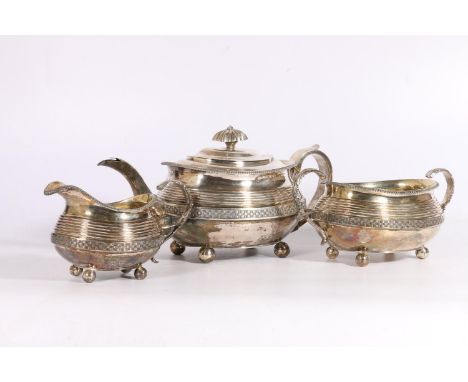 George III silver three-piece tea set of attractive boat shape with 'woven' band, makers mark SH, probably for Solomon Hougha