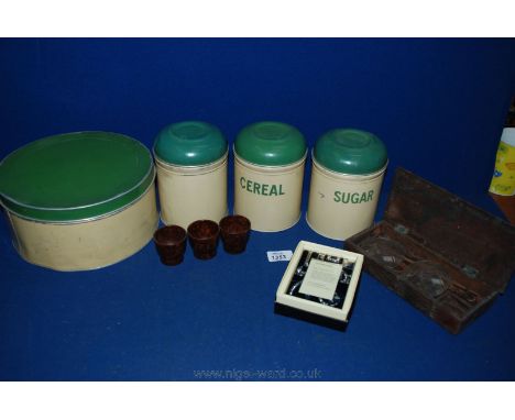 A quantity of miscellanea including Bakelite egg cups, novelty sponge tin set, boxed set of scales and a ''Past Times'' deco 