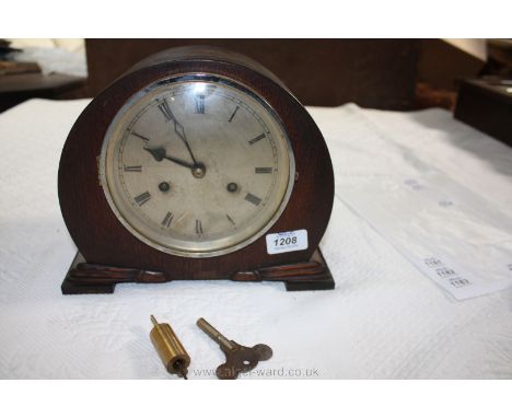 A British made circa 1935 Oak cased mantle Clock by Tower Clocks, domed Oak case with chrome trim glass door to the alloy fac