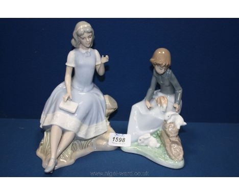 A Nao figure of a girl with rabbits, plus a Nao style of a girl with a book a/f